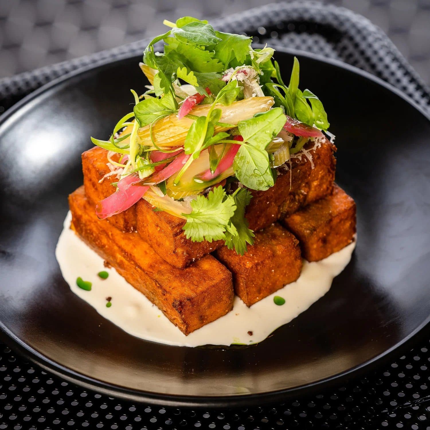 A plated dish at Bar Nico