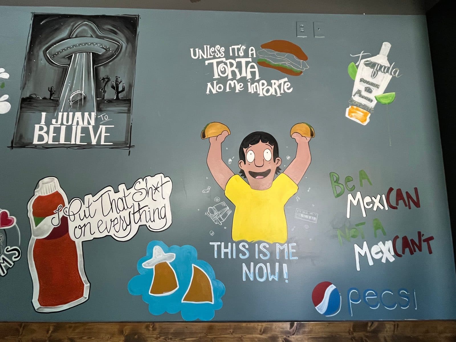 The hand-painted mural wall at Faustinos