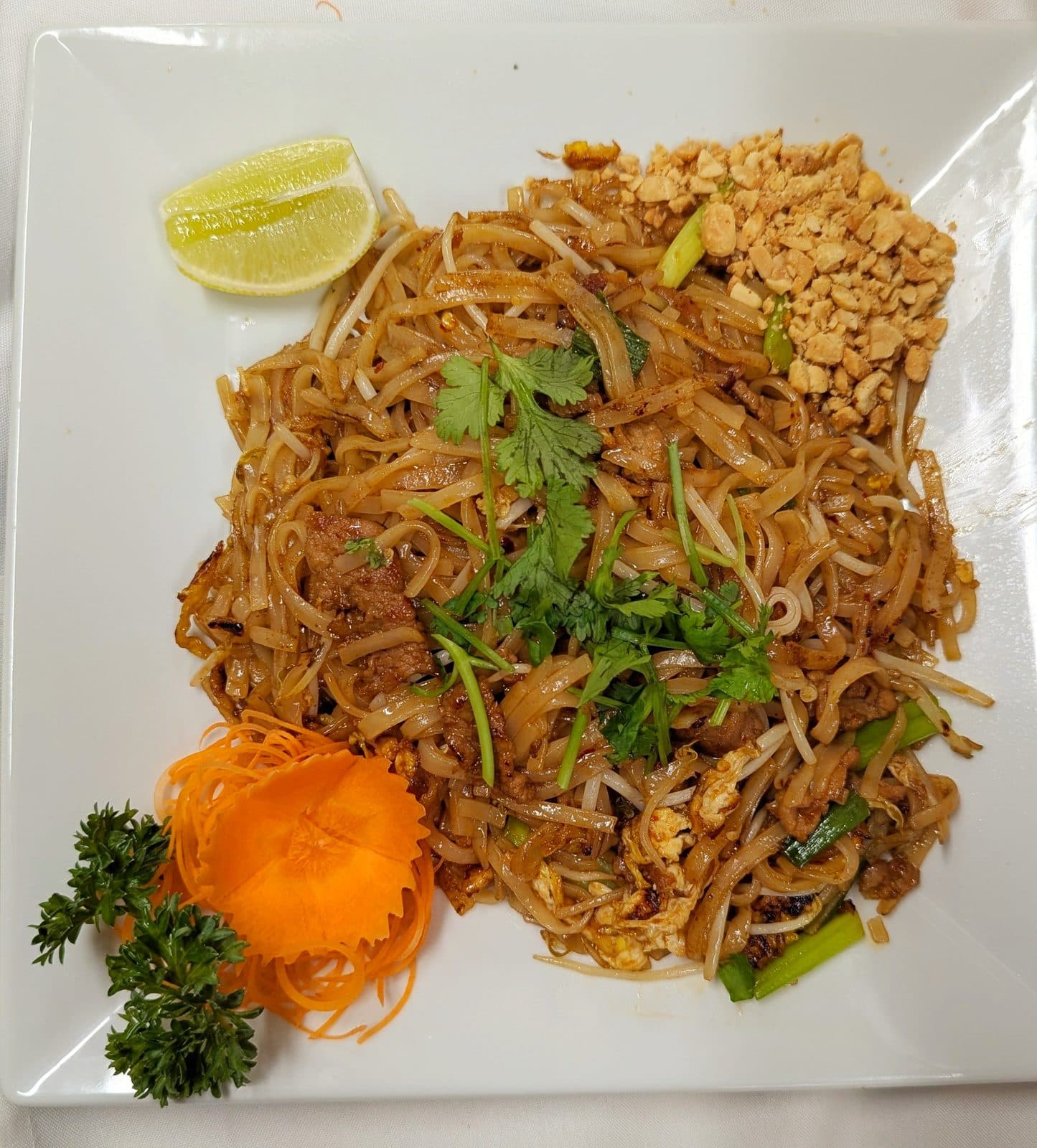 Pad Thai with peanuts, lime, and cilantro at Hoang Khao