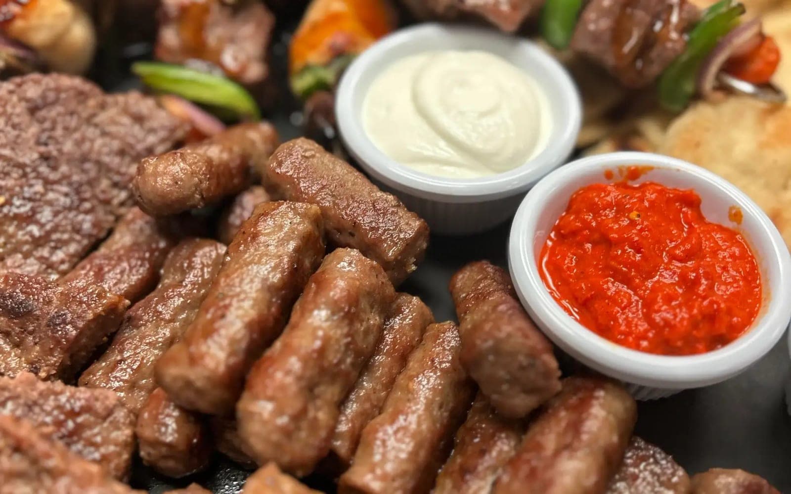 Cevapi sausages with kajmak and ajvar at Titos Lounge