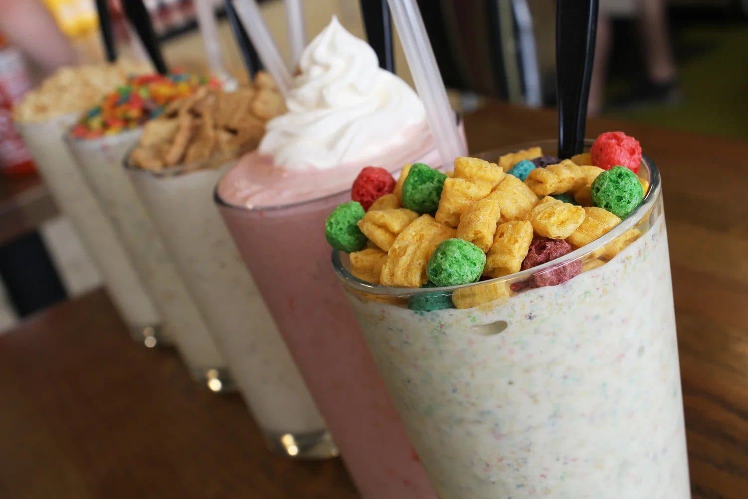 A row of cereal-topped milkshakes at Zombie Burger